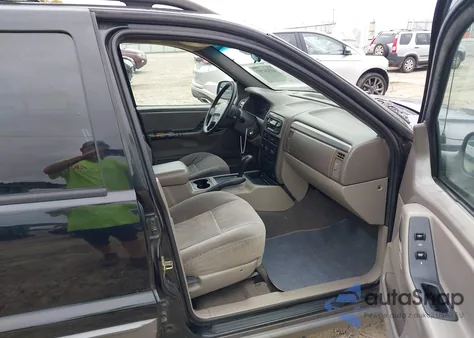 2001 Jeep Grand Cherokee Laredo z USA, uszkodzony, nr VIN 1J4GX48S01C543561